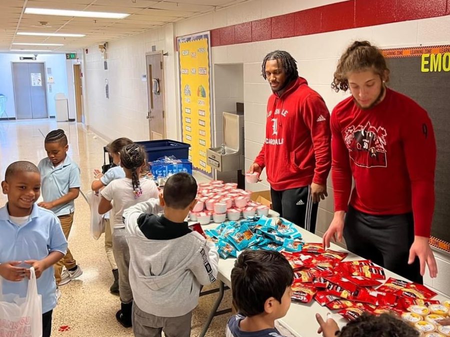 Louisville Football players